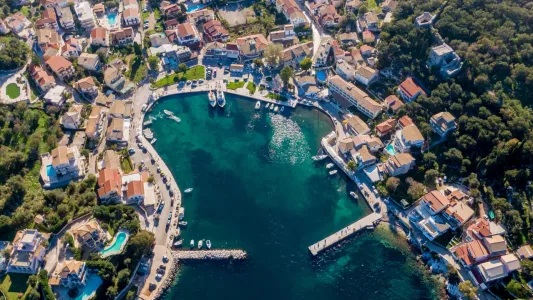 Explore Kassiopi by Car and Discover its Historic Harbour and Beaches